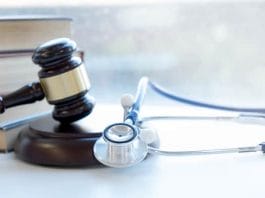 Gavel and stethoscope. medical jurisprudence. legal definition of medical malpractice. attorney. common errors doctors, nurses and hospitals make.