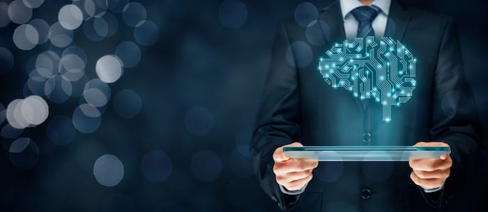 Artificial intelligence (AI), data mining, expert system software, genetic programming, machine learning, deep learning, neural networks and another modern computer technologies concepts. Brain representing artificial intelligence with printed circuit board (PCB) design.