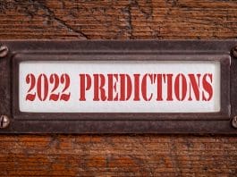 2022 predictions - a label on grunge wooden file cabinet. Expectation and speculation for the incoming year.