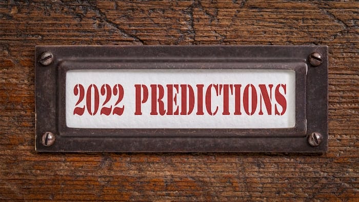 2022 predictions - a label on grunge wooden file cabinet. Expectation and speculation for the incoming year.