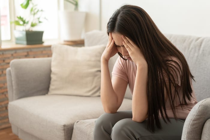 Woman suffering from headache