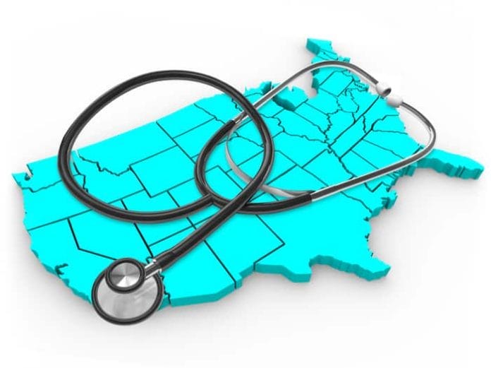 A United States map with a stethoscope across it, symbolizing national health care policy and wellness of the population