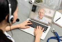 Doctor talking with a senior patient. Telemedicine concept