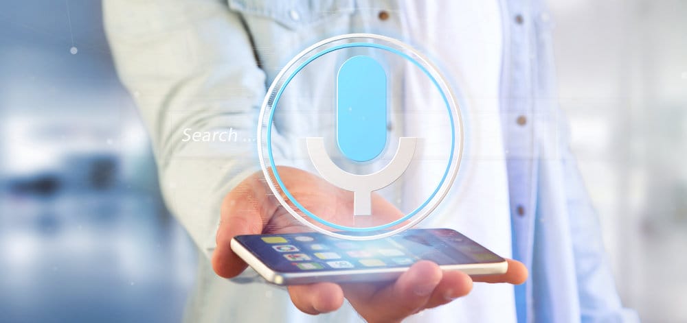 View of a Businessman holding a Vocal search system with button and icon3d rendering