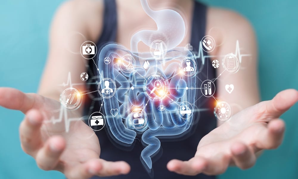 Woman on blurred background using digital x-ray of human intestine holographic scan projection 3D rendering