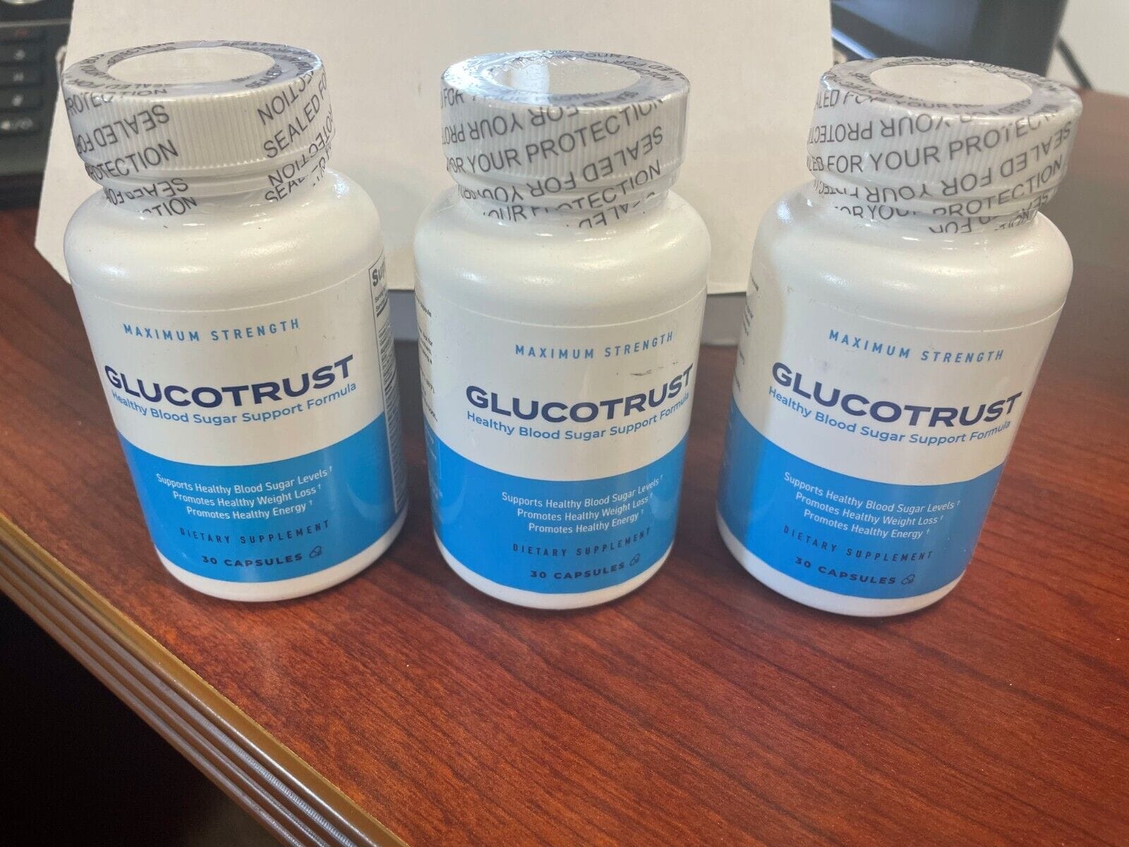 Photo of 3 GlucoTrust Bottles on a table for a GlucoTrust Review article