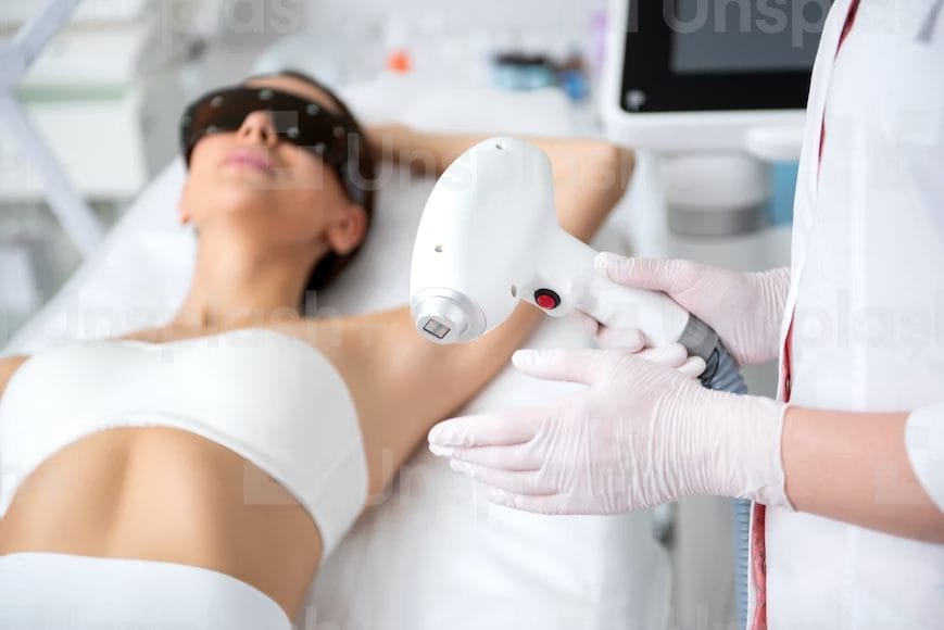 Woman undergoing laser hair removal.