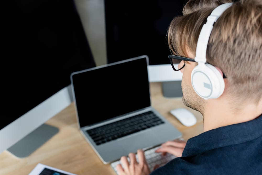 A person using Surfshark VPN app with multiple features