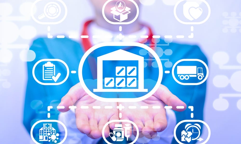 A person wearing blue holds out their hands, and icons for health care warehouse logistics are superimposed over them.